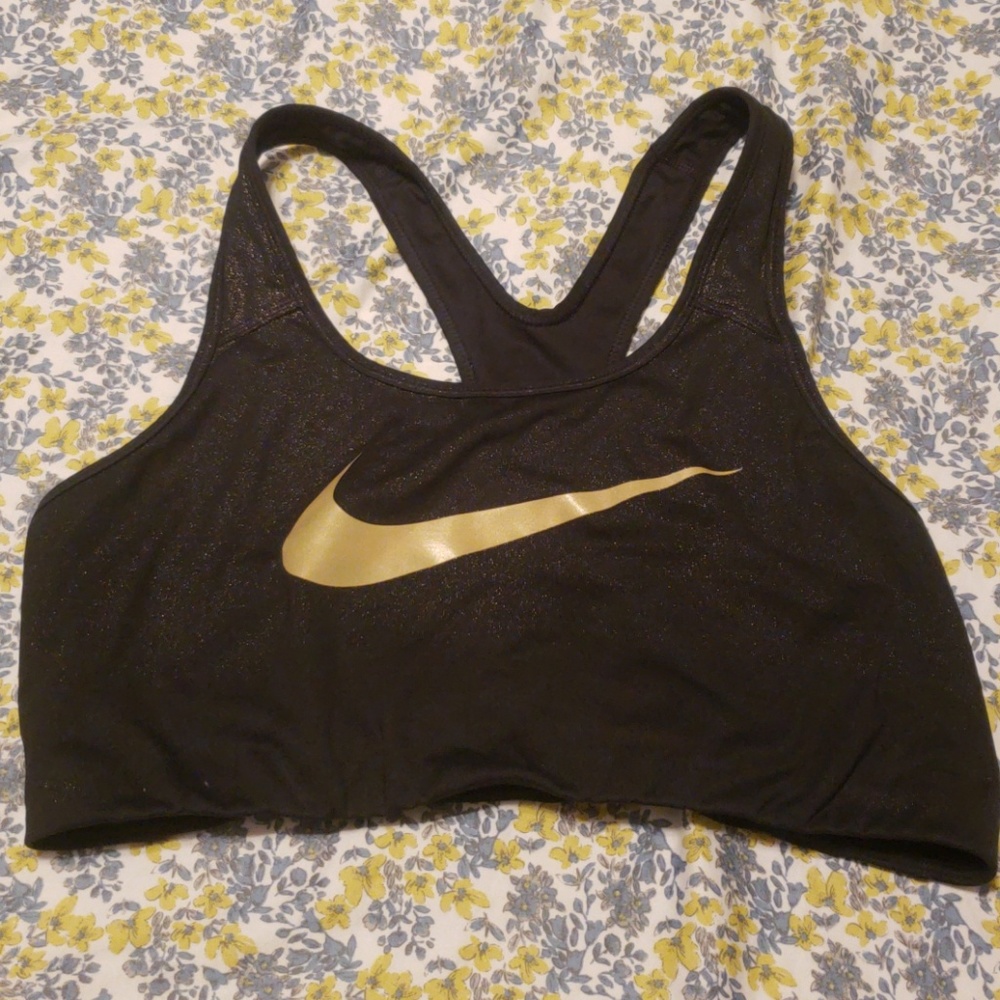 Black and gold Nike sports bra